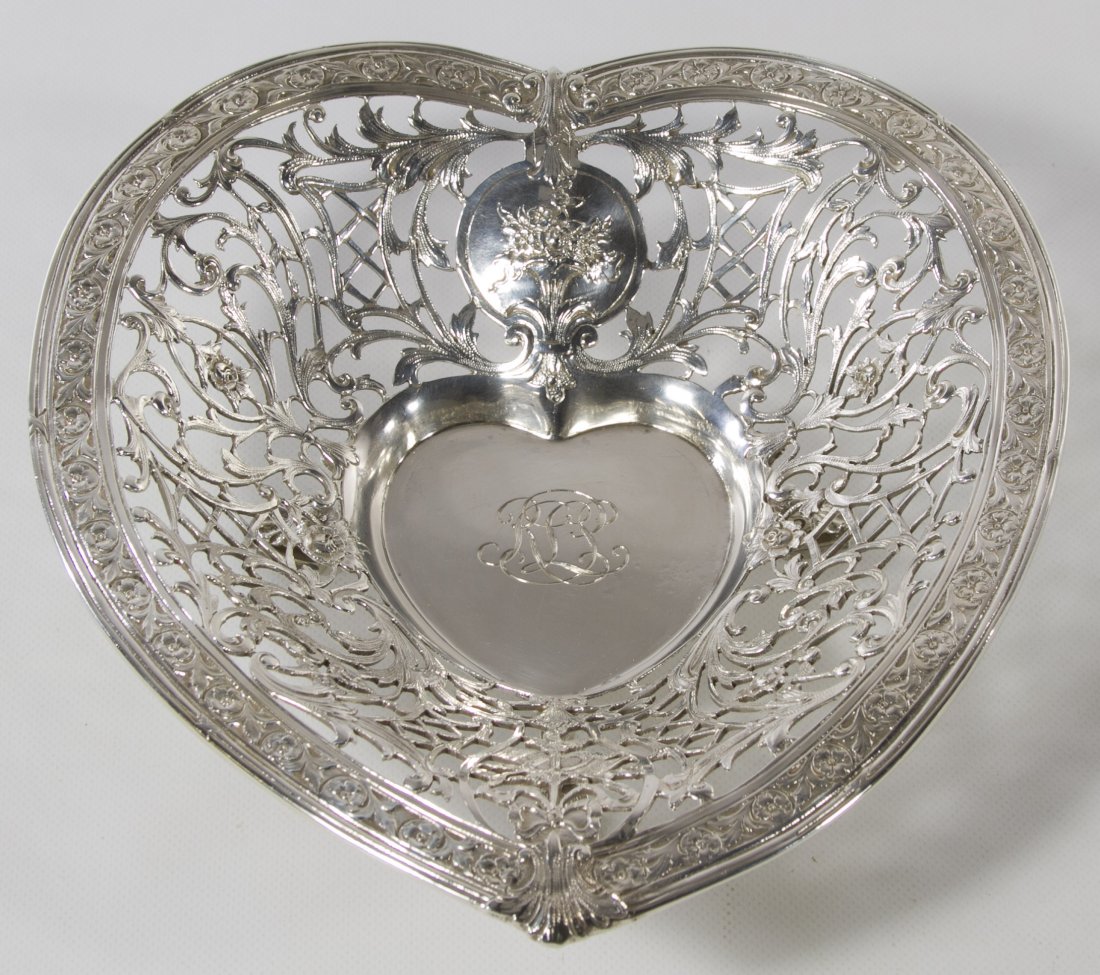Sterling Silver Tray by Black, Starr & Frost: Sterling Silver Tray by Black, Starr & Frost Pierced heart-shaped tray having repousse designs Length: 7.50 inches, Width: 6.75 inches Weight: 8.49 ozt. Category: Silver > Sterling Silver Hollowware S