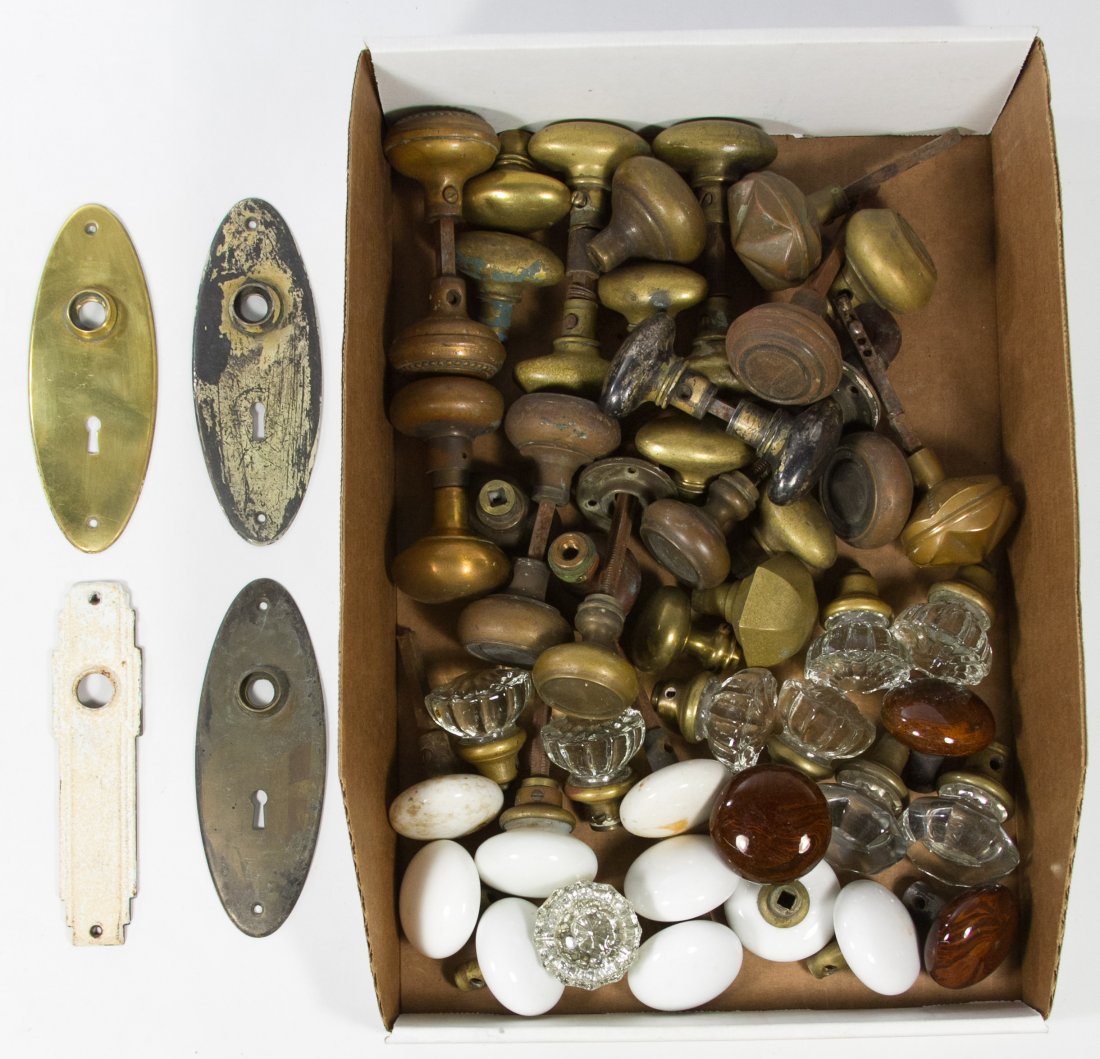 Antique Door Knob and Escutcheon Assortment: Antique Door Knob and Escutcheon Assortment Including milk glass, clear glass, mottled brown glass and brass door knobs; along with tinplate escutcheons Length: 7.00 inches (plate) Category: Primitive