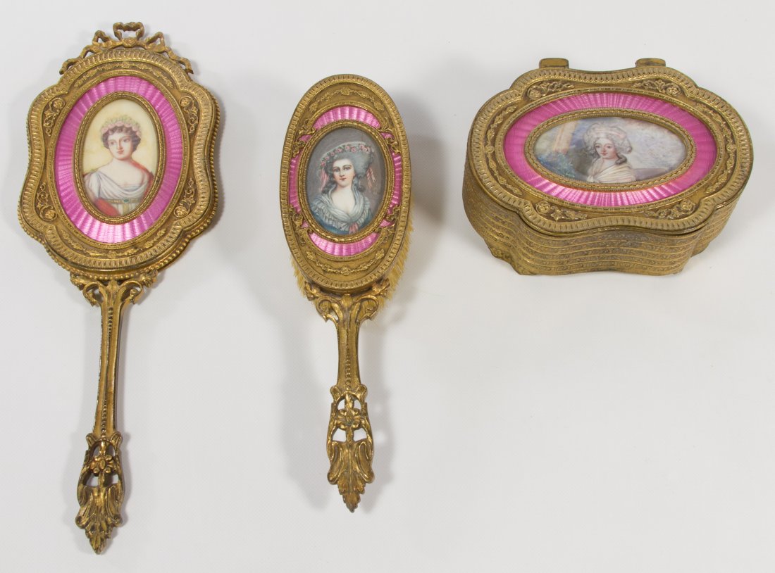 Dresser Set with Portrait Cartouche: Dresser Set with Portrait Cartouche Three items including a box, a hand mirror and a brush; guilloche pink enamel border and bronze dore frames; hand painted portraits Length: 12.00 inches (mirror) Ca