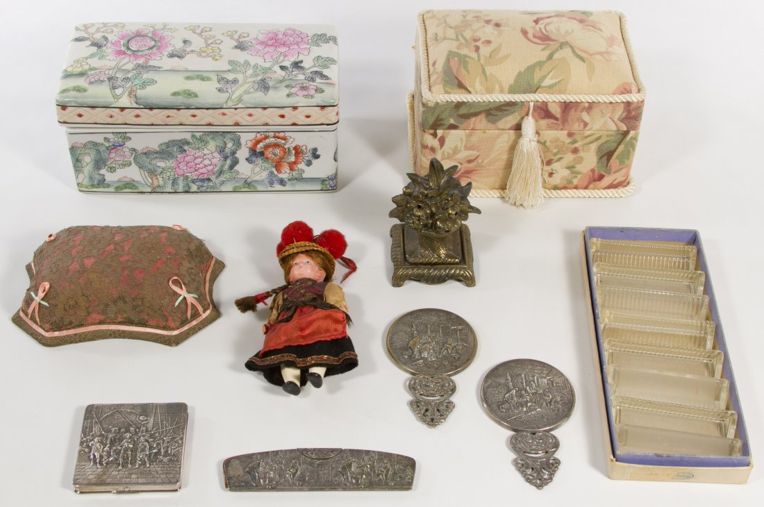 Hans Jensen Silverplate Dresser Accessories: Hans Jensen Silverplate Dresser Accessories Including two mirrors, a compact and a comb; together with two jewelry boxes, glass knife rests, pin cushion, toy doll and a decorative metal object Height: