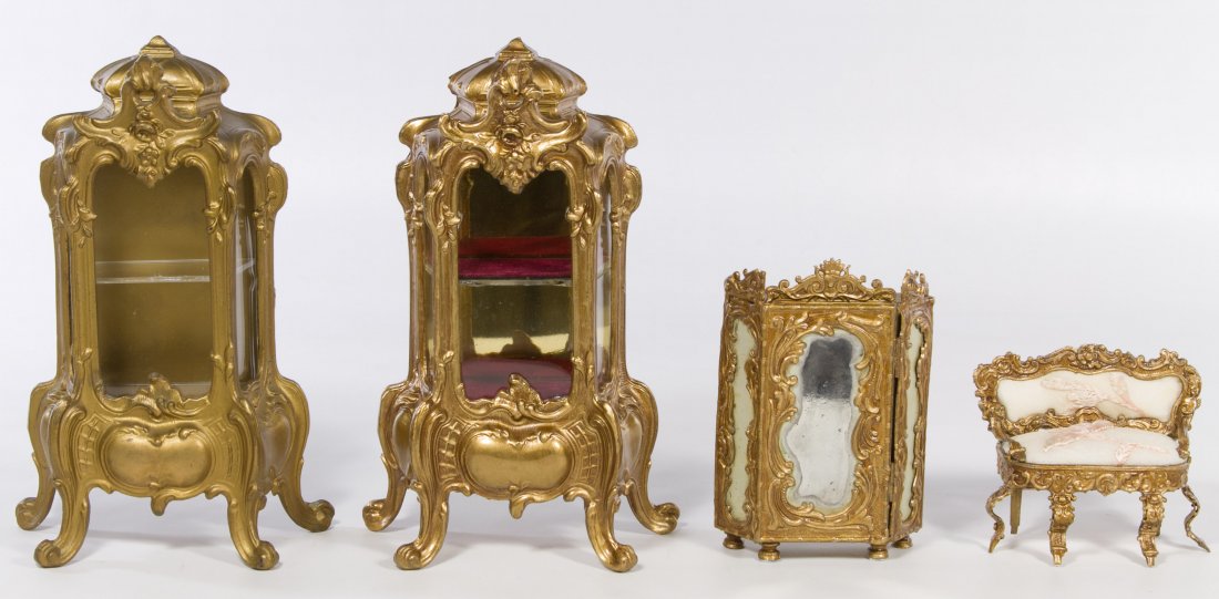 Vitrine Style Dresser Box Assortment: Vitrine Style Dresser Box Assortment Four items including two miniature Rococo style glass and gilt metal display cabinets, a small box with two compartments and a small gilt metal settee Height: 8.50