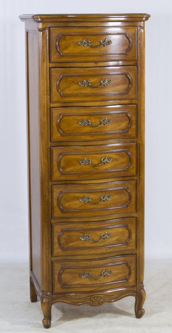 Pecan Dresser by Thomasville: Pecan Dresser by Thomasville Having seven drawers and brass drawer pulls Height: 56.50 inches, Width: 22.00 inches, Depth: 17.00 inches Category: Furniture > American Shipping Status: 3rd Party Shippi