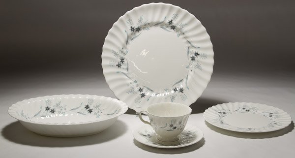 Royal Doulton 'Millefleur' China Service: Royal Doulton 'Millefleur' China Service Forty seven items including (9) dinner dishes, (9) salad plates, (9) bread plates, (9) saucers, (7) coffee cups, a creamer, a sugar bowl, an oval platter and a