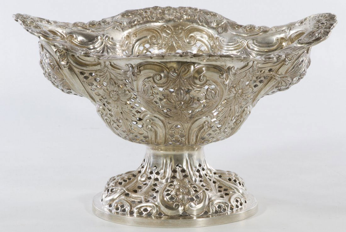 Charles Stuart Harris Sterling Silver Center Bowl: Charles Stuart Harris Sterling Silver Center Bowl c.1892 basket with English hallmarks under rim Height: 7.00 inches, Length: 12.00 inches, Width: 10.00 inches Weight: 25.72 ozt. Category: Silver > St