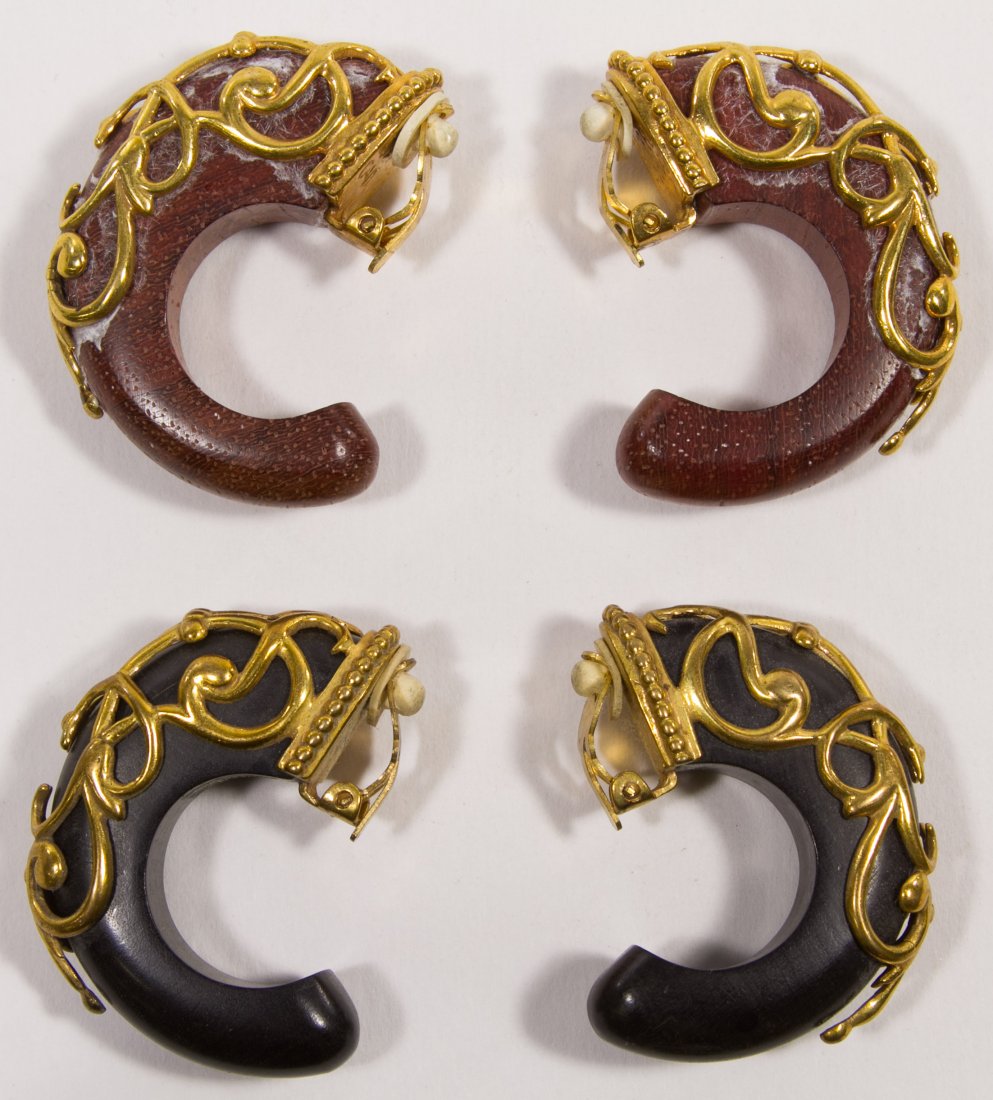 Isabel Canovas Earrings: Isabel Canovas Earrings Two marked pairs of clip earrings made of carved wood hoops wrapped with gold tone filigree Height: 2.00 inches Category: Jewelry and Timepieces > Costume Shipping Status: Leon