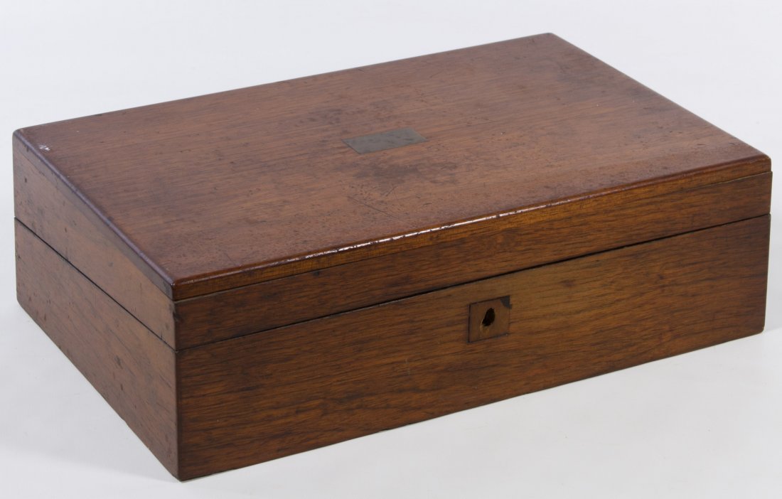 Antique Walnut Writing Lap Desk: Antique Walnut Writing Lap Desk Having the key and an ink bottle Height: 4.25 inches, Width: 14.00 inches, Depth: 9.00 inches (when closed) Category: Books & Ephemera > Other Tax Status: Subject to an