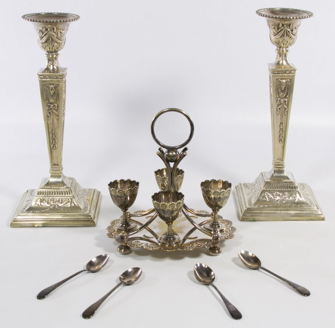 Silverplate Candlesticks and Egg Cruet: Silverplate Candlesticks and Egg Cruet Including four egg cups and four spoons and a pair of candleholders Height: 12.00 inches (tallest) Category: Silver > Silverplate Hollowware Shipping Status: Leo