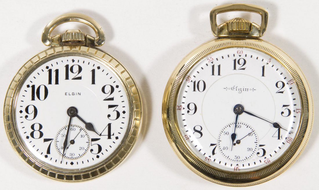 Elgin Railroad Grade Pocket Watches: Elgin Railroad Grade Pocket Watches Two pocket watches both in gold filled open face cases being stem wind and lever set including a Veratis serial #10372286 from 1904, having 21 jewels, grade 239, mo