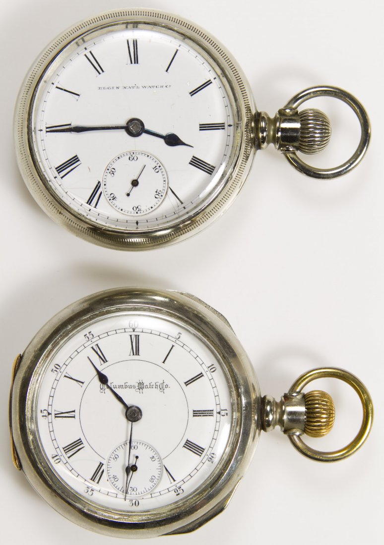 Silvertone Open Face Case Pocket Watches: Silvertone Open Face Case Pocket Watches Two pocket watches including an Elgin serial #7510269 from 1899, stem wind, lever set, 7 jewels and a Columbus serial #302764 from 1897 stem wind, lever set, D