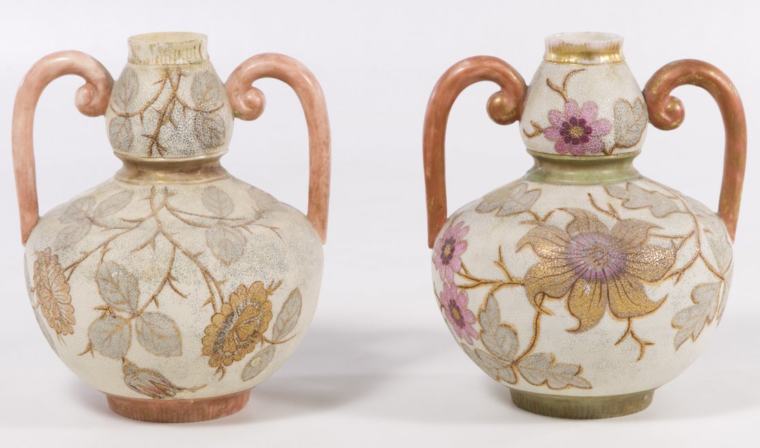 Rudolstadt Double Handled Vases: Rudolstadt Double Handled Vases German, two double handled vases, having a gold and pink floral motif; both have raised maker mark and the numbers 50 and 1600 stamped on the underside Height: 6.50 inc