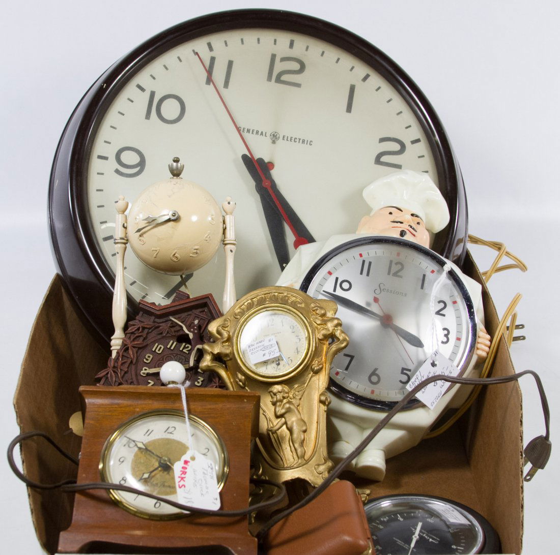 Gilded New Haven Dresser Clock: Gilded New Haven Dresser Clock Together with seven clocks; some produced by Seth Thomas and General Electric Length: 15.00 inches Category: Decorative Arts > Clocks Tax Status: Subject to an 8.25% sal