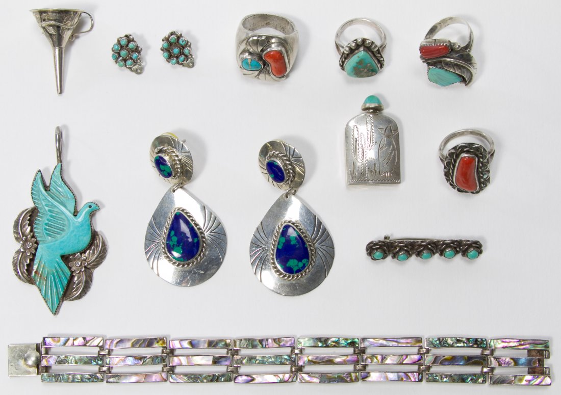 Sterling Silver Jewelry Assortment: Sterling Silver Jewelry Assortment Including four rings, two pair of earrings, a pendant, a pin, a bracelet and a perfume bottle with funnel; having turquoise, coral and mother of pearl Length: 7.50 i