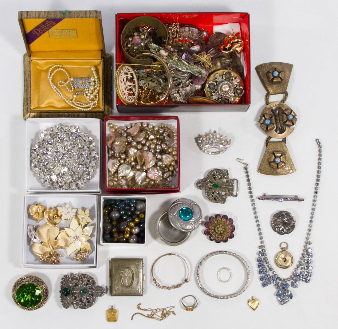 Costume Jewelry Assortment: Costume Jewelry Assortment Including pins, earrings, bracelets and necklaces; some signed including Trifari; some Rhinestone jewelry; together with empty small jewelery boxes Category: Jewelry and Tim