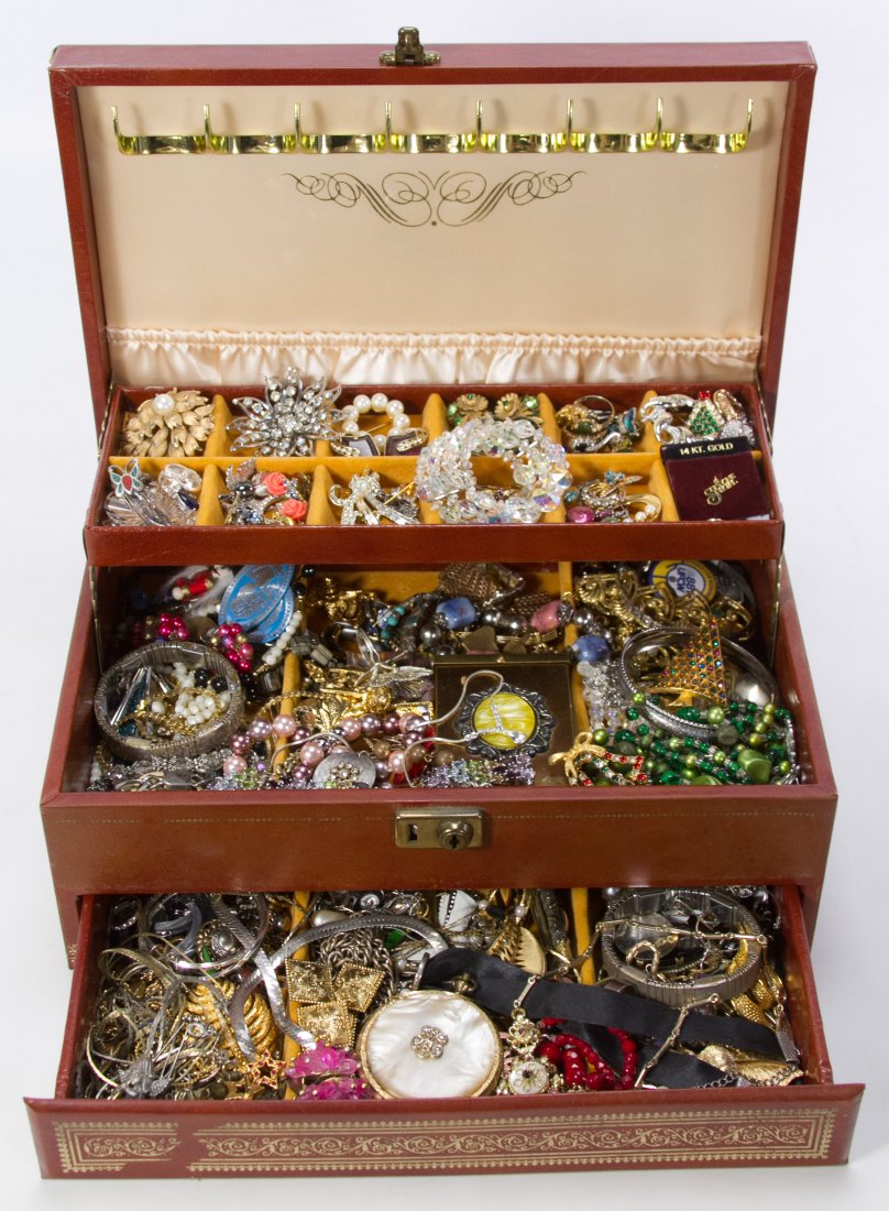 Sterling Silver and Costume Jewelry Assortment: Sterling Silver and Costume Jewelry Assortment In tooled leather jewelry box Category: Jewelry and Timepieces > Costume (Bulk Lots) Shipping Status: Leonard Auction, Inc. will directly ship via USPS I