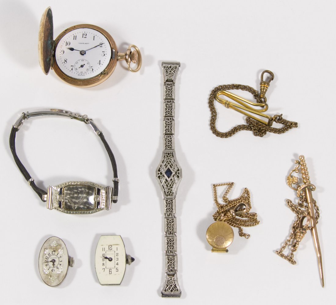 Bulova 14k White Gold Cased Wrist Watch: Bulova 14k White Gold Cased Wrist Watch Together with an 18k white gold plated watch band, a Vigilant pocket watch, three pocket watch chains and Hallmark wrist watch movement Length: 5.00 inches (wat