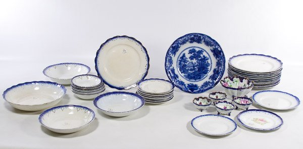 Flow Blue Dish Assortment: Flow Blue Dish Assortment Thirty eight items including dinner plates, fruit bowls, serving dishes and bread plates with some marked 'Sterling China' | Pastel Pottery Assortment, Including ceramic dish