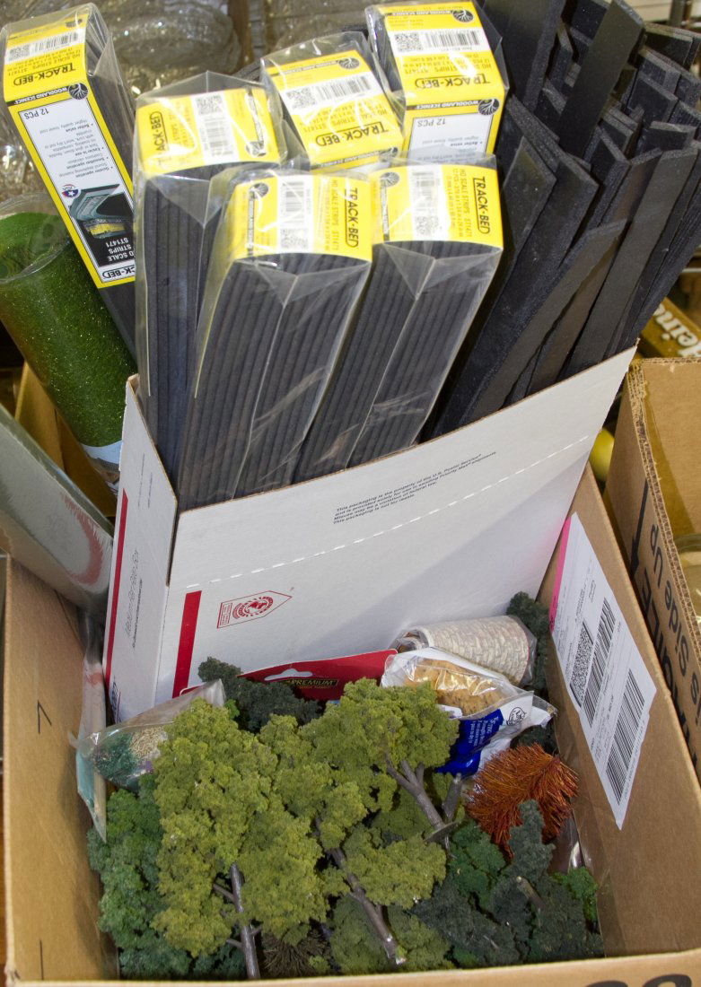 Model Train Landscape Accessory Assortment: Model Train Landscape Accessory Assortment Including ground covers rolled up in tubes, artificial trees and fencing Category: Toys and Dolls > Post-War Trains Shipping Status: 3rd Party Shipping; the