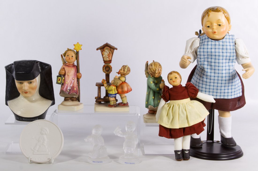 Hummel Figurine Assortment: Hummel Figurine Assortment Three figurines including #343 'Christmas Song', #23/0 'Adoration' and #21/0 1/2 'Heavenly Angel'; together with a Hummel Sister Berta figurine, a collector token, two glass