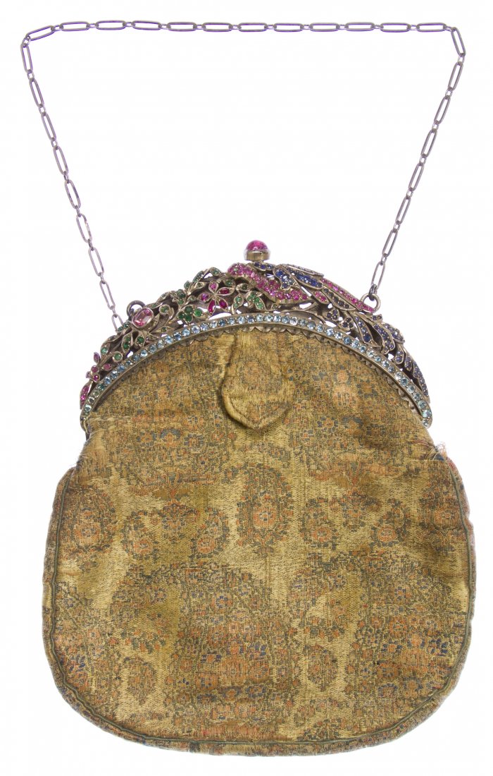 Purse having Sterling Silver and Semi-Precious Gemstone: Purse having Sterling Silver and Semi-Precious Gemstone Frame Cloth purse having sterling silver frame set with rubies, sapphires, blue topaz and emeralds Length: 7.25 inches (without chain handle) Ca