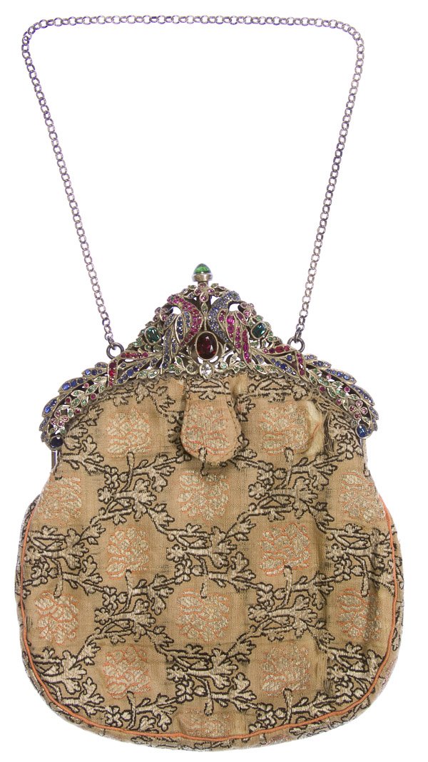 Purse having Sterling Silver and Semi-Precious Gemstone: Purse having Sterling Silver and Semi-Precious Gemstone Frame Cloth purse having sterling silver frame set with rubies, sapphires and emeralds Length: 8.00 inches (without chain handle) Category: Clot