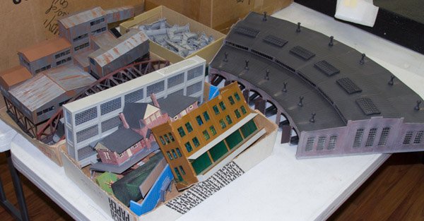 Model Train Building Assortment: Model Train Building Assortment Including a six door round house and Hiram Walker Distillery building in HO scale Length: 30.00 inches (largest) Category: Toys and Dolls > Vintage Trains Shipping Stat