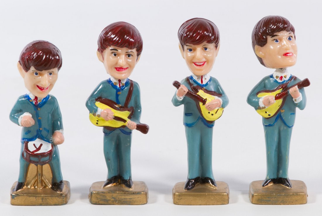 'The Beatles' Figurine Set: 'The Beatles' Figurine Set Four painted hard plastic figurines marked 'Made in Hong Kong' on the undersides Height: 4.00 inches Category: Collectibles > Hollywood Tax Status: Subject to an 8.25% sales