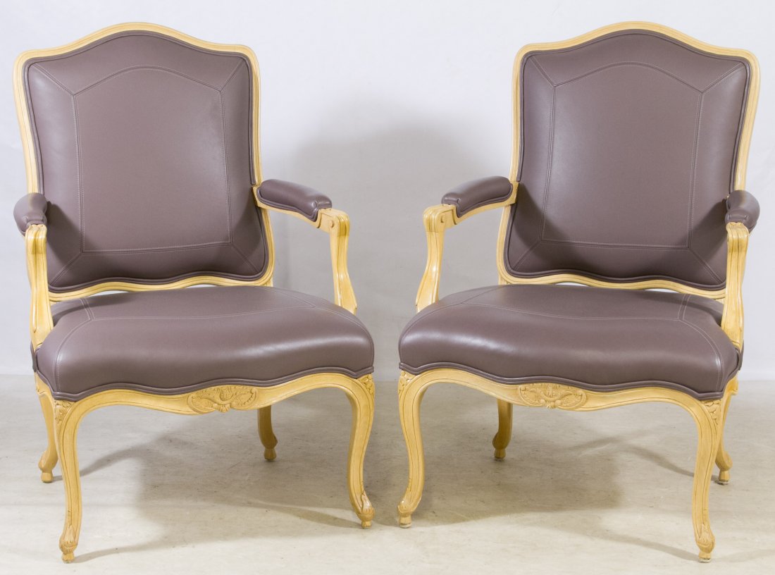 Leather Upholstered Arm Chairs by Sally Sirkin Lewis: Leather Upholstered Arm Chairs by Sally Sirkin Lewis for J. Robert Scott & Associates, Inc. Having Louis XVI style frames, light purple leather upholstery and light painted wood Height: 38.00 inches,