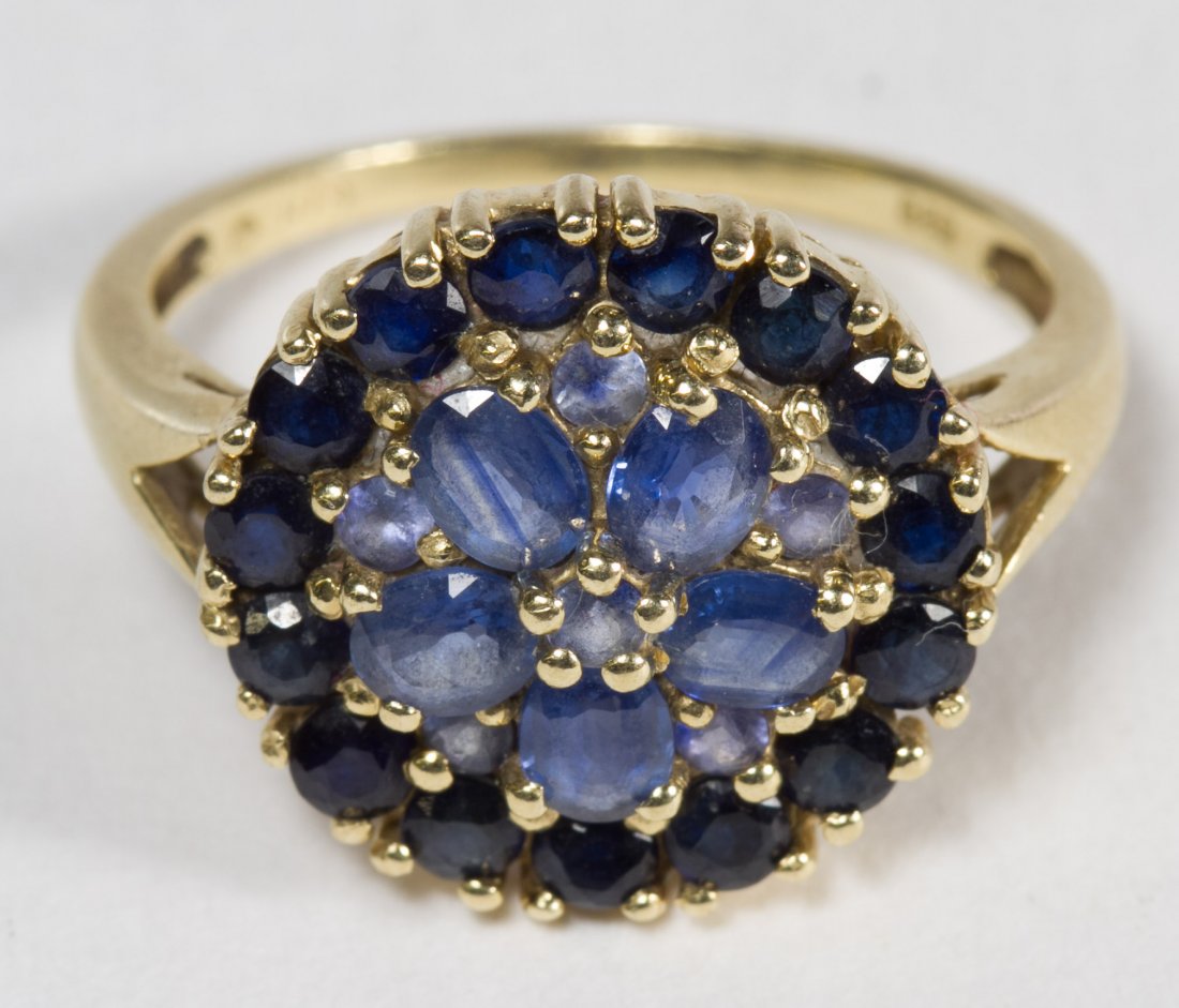 14k Gold and Blue Spinel Ring: 14k Gold and Blue Spinel Ring Having oval and round cut stones arranged in a flower design Size: 6.5 Weight: 2.06 dwts. (total weight) Category: Jewelry and Timepieces > 14k Gold Shipping Status: Leon