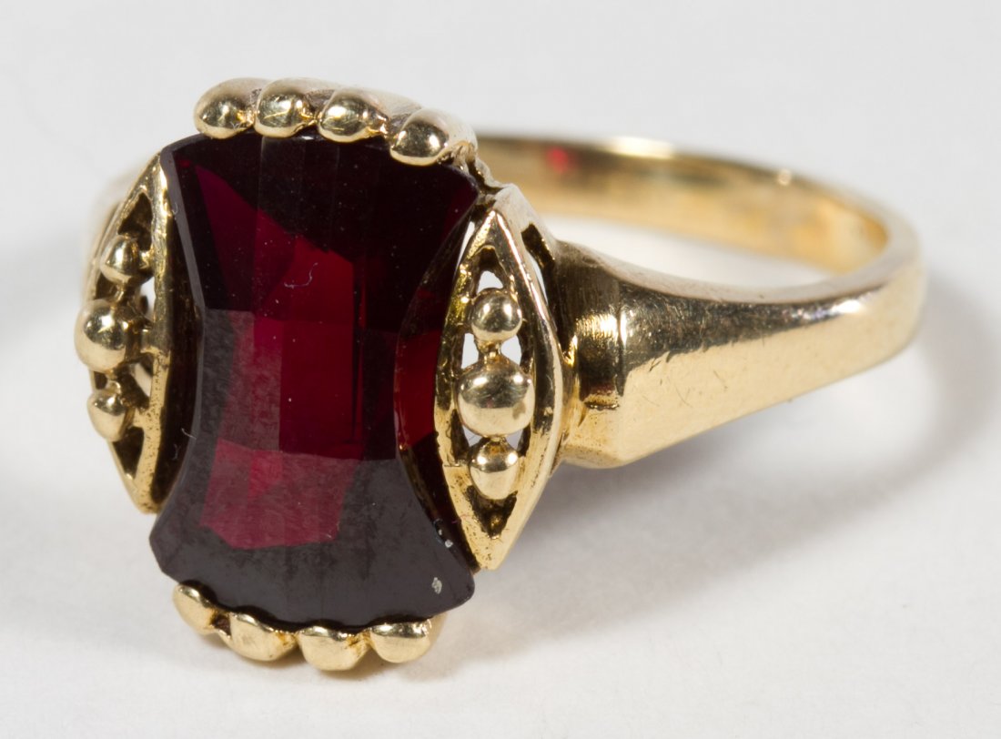 10k Gold and Ruby Ring: 10k Gold and Ruby Ring Having a rectangular cut ruby Size: 7 Weight: 2.51 dwts. (total weight) Category: Jewelry and Timepieces > 10k Gold Shipping Status: Leonard Auction, Inc. will directly ship via