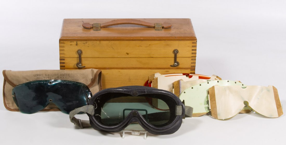 World War II B-8 USAF Flying Goggle Kit: World War II B-8 USAF Flying Goggle Kit Including the goggles, a variety of different Polaroid lenses, a canvas bag and a wood box Length: 11.50 inches (box) Category: Military & Weapons > World War I