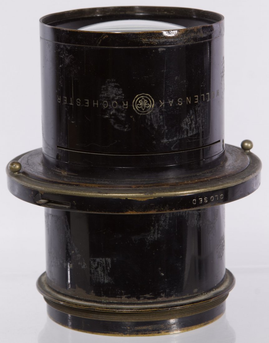 Wollensak-Rochester Verito 11 1/2' Lens: Wollensak-Rochester Verito 11 1/2' Lens Having flange with 'Diffused Focus F-4' and 'Studio pat. 1907' inscribed around lens Length: 6.00 inches, Diameter: 3.50 inches (lens) Category: Cameras and Ele