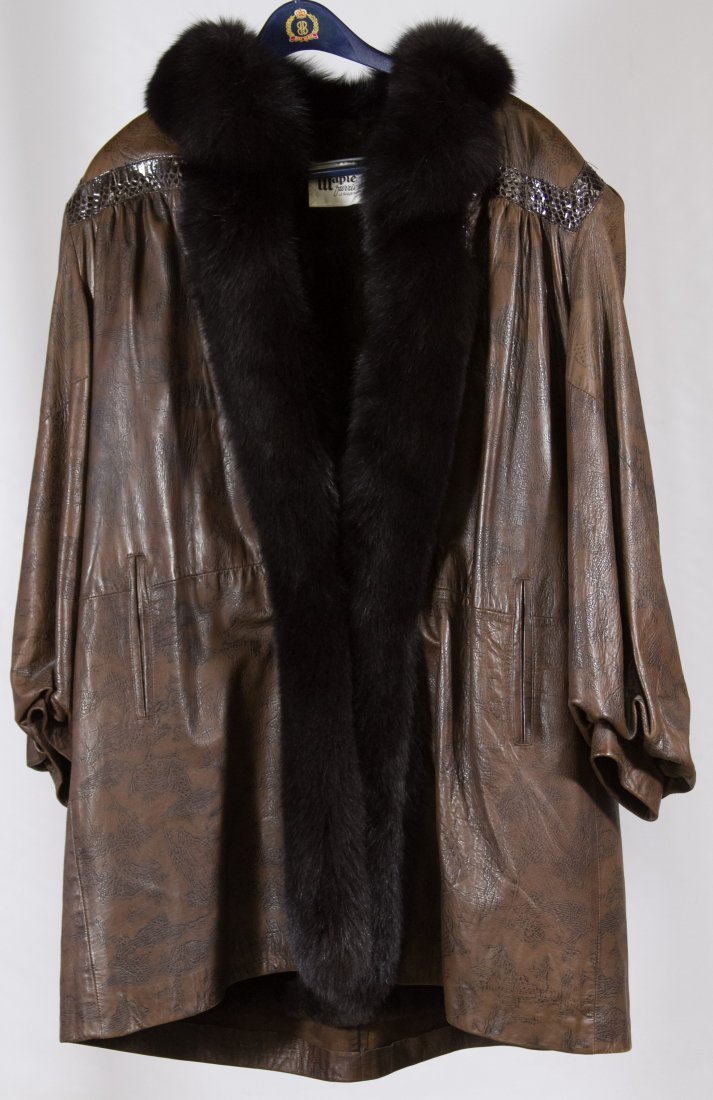 Leather, Fox and Beaver Coat by Maple Furriers: Leather, Fox and Beaver Coat by Maple Furriers Having a brown leather exterior with pocket slots Length: 34.00 inches, Width: 18.75 inches Category: Clothing & Accessories > Coats Shipping Status: Leo