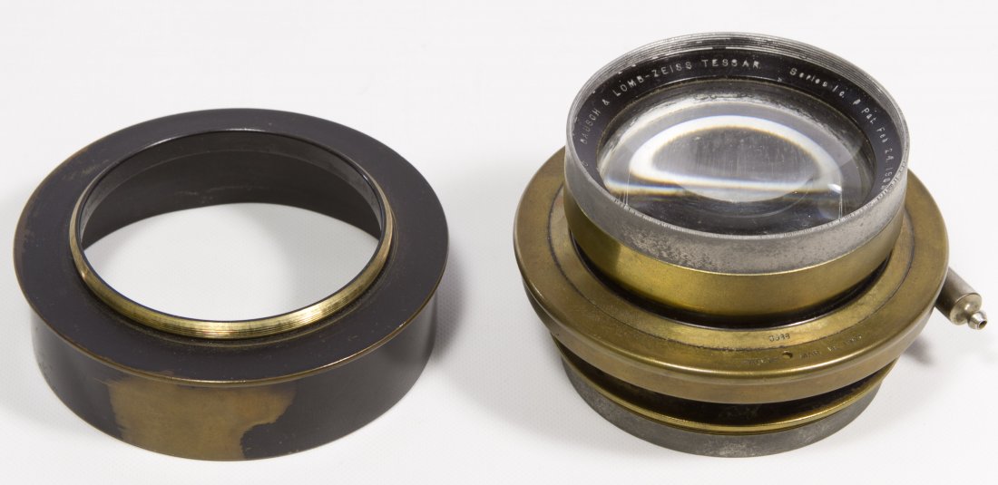Bausch & Lomb-Zeiss Tessar Lens: Bausch & Lomb-Zeiss Tessar Lens For an 8 x 10 large format camera, having 'Studio' and '3088' incised on brass ring and 'no. 1494250' on side of lens Diameter: 4.25 inches Category: Cameras and Electr
