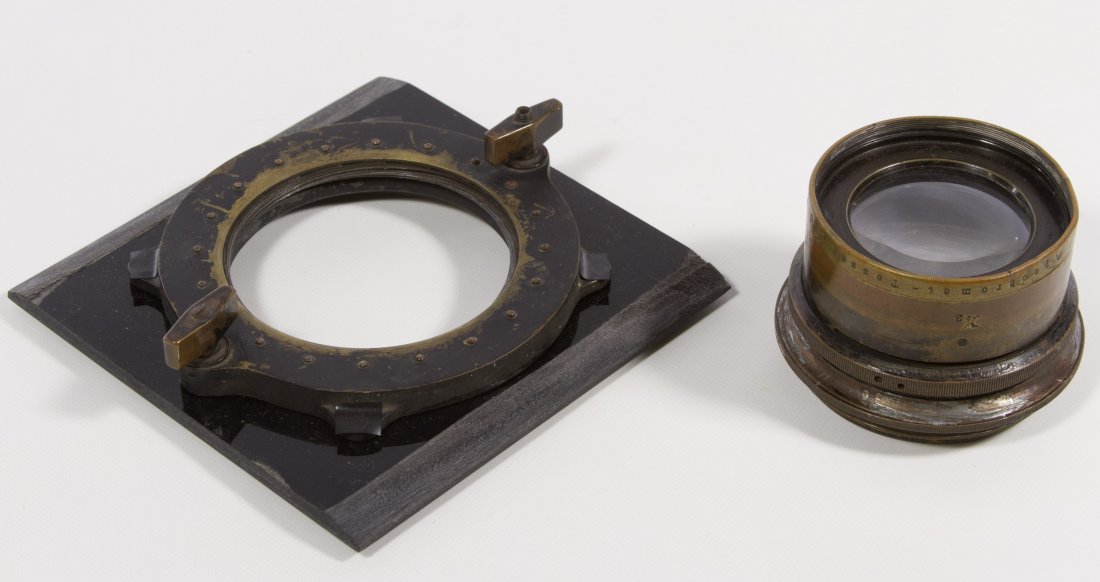 Carl Zeiss Jena Apochromat Tessar 1:10 Lens: Carl Zeiss Jena Apochromat Tessar 1:10 Lens Having 'f=46cm' and 'Nr.69777' incised on the brass ring around lens; along with a separate board mount Length: 2.25 inches, Diameter: 2.75 inches Category: