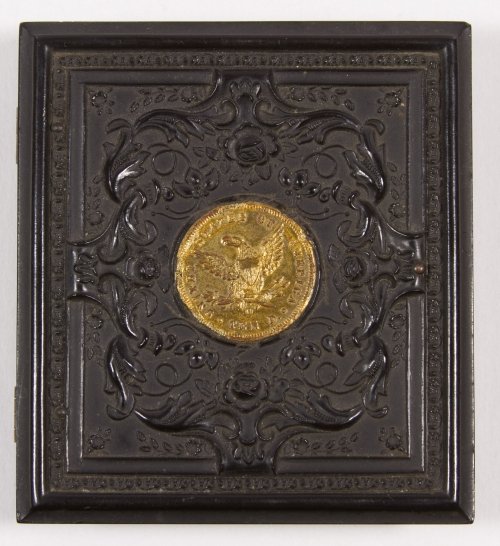 Civil War 1/6 Plate Gutta-Percha Case with Faux $10: Civil War 1/6 Plate Gutta-Percha Case with Faux $10 Gold Coin Motif Containing an ambrotype photograph of a young woman Height: 4.00 inches, Width: 3.25 inches Category: Books & Ephemera > Photographs