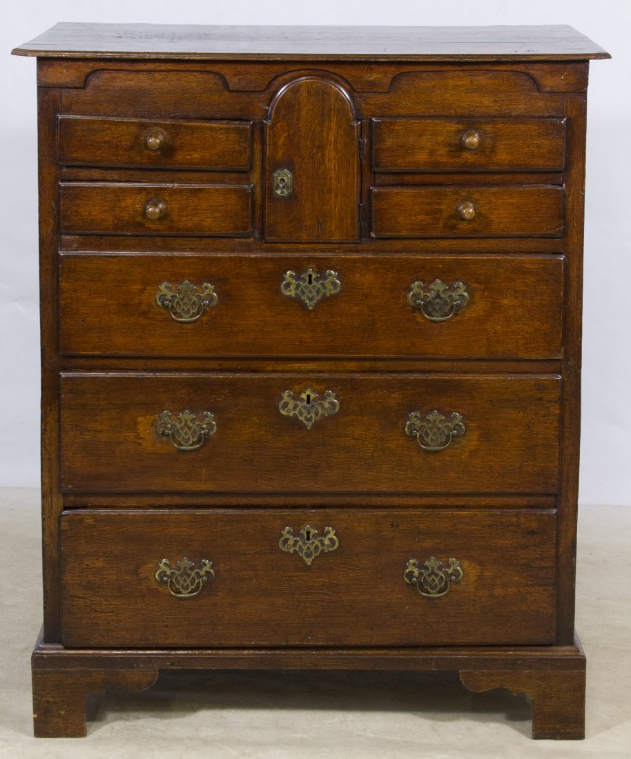 English Oak Butler's Cabinet: English Oak Butler's Cabinet c.1850, having four small drawers with center compartment over three full drawers Height: 41.00 inches, Width: 34.00 inches, Depth: 19.50 inches Category: Furniture > Engl