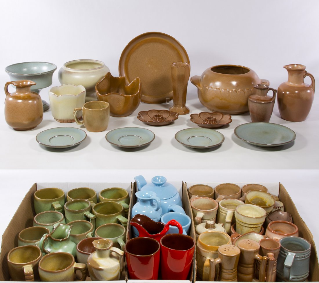 Frankoma Pottery Assortment: Frankoma Pottery Assortment Fifty six items including plates, coffee cups, pitchers, a teapot, a casserole, two sets of salt and pepper shakers, candle holders and vases in green, tan, orange and blue