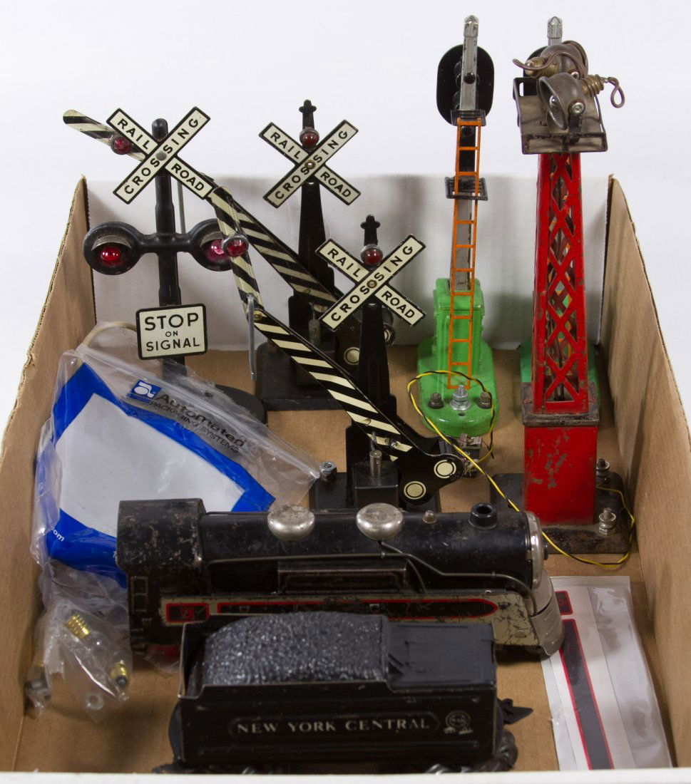 Marx Engine with Tender and Lionel Model Train Signals: Marx Engine with Tender and Lionel Model Train Signals Eight items including a Marx 'Marlines' New York Central coal tender, an engine, two Lionel '153-3' signal lights, three rail road crossing signa