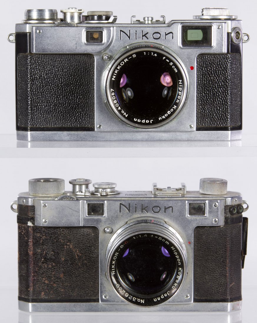 Nikon Nippon Kogaku 35mm Cameras: Nikon Nippon Kogaku 35mm Cameras Two cameras, one having serial #6103149 with a f=5cm lens #328239 and one having serial #6183936 and a f=5cm lens #408067 Width: 5.50 inches (widest camera) Category: 