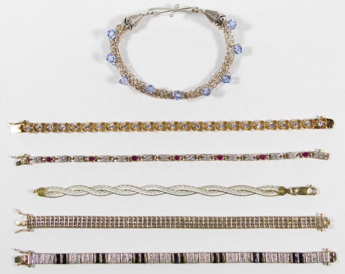 Sterling Silver Bracelets: Sterling Silver Bracelets Six bracelets having diamond chips, semi-precious gemstones and clear and colored crystal; semi-precious including sapphires and rubies Length: 7.25 inches (longest) Weight: 