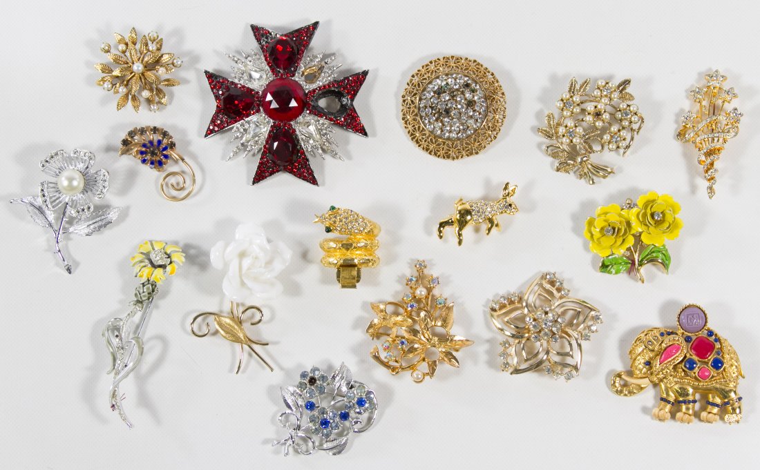 Signed Costume Jewelry Pin and Brooch Assortment: Signed Costume Jewelry Pin and Brooch Assortment Sixteen items including examples from Jay Feinberg, Hattie Carnegie, Karu and Trifari Height: 3.00 inches (Feinberg pin) Category: Jewelry and Timepiec