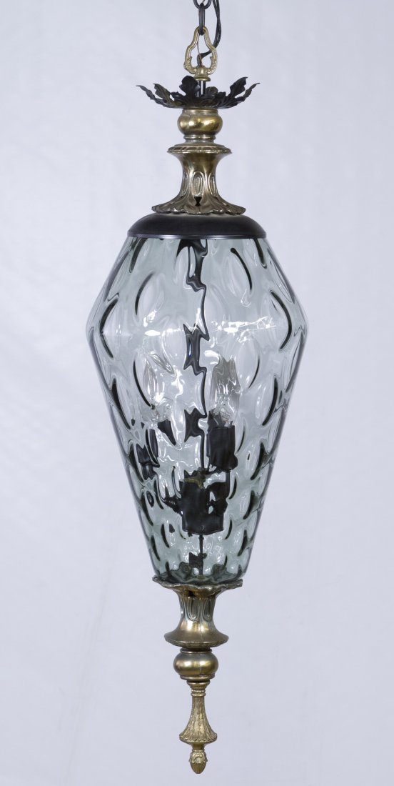 Mid-Century Modern Ceiling Fixture: Mid-Century Modern Ceiling Fixture Having a glass globe and brass tone metal leaf crown Height: 33.00 inches, Width: 9.00 inches Category: Decorative Arts > Mid-Century Modern Shipping Status: Due to 
