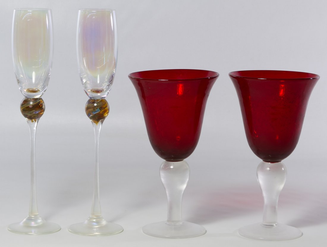 Brioni Champagne Flutes: Brioni Champagne Flutes A pair of signed Brioni 'Gold Planet' champagne flutes; together with a pair of red glass water goblets Height: 11.25 inches (champagne flutes) Category: Glass > Art Glass Ship