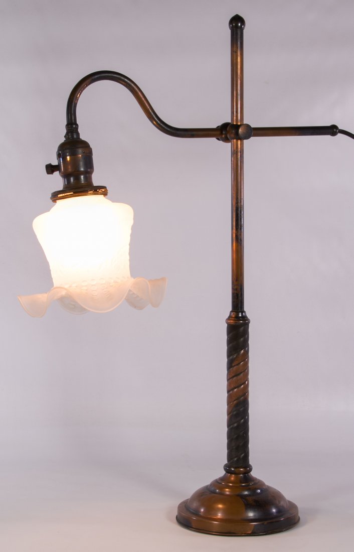 Copper Industrial Desk Lamp by Faries: Copper Industrial Desk Lamp by Faries Early 20th Century, having a weighted interior and a frosted glass shade; stamped mark on the bottom rim Height: 22.50 inches, Width: 16.50 inches Category: Decor