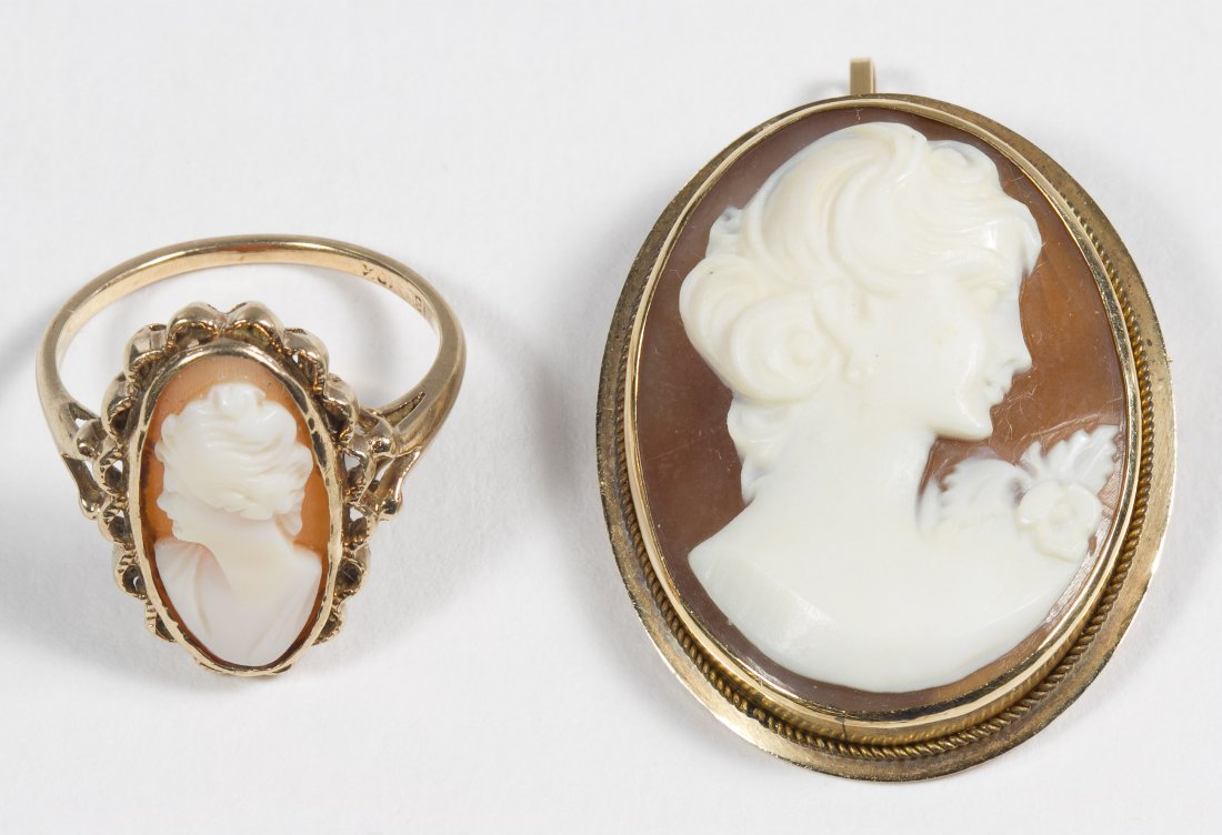 10k Gold and Cameo Jewelry Assortment: 10k Gold and Cameo Jewelry Assortment Including a pin / pendant and ring, both having carved shell female profiles Length: 1.50 inches (pendant) Size: 7 Weight: 4.82 dwts. (total weight) Category: Jew