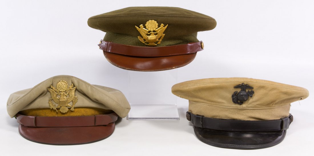 World War II US Officer Visor Hat Assortment: World War II US Officer Visor Hat Assortment Three hats including a Navy Bancroft hat, a Dobbs marked green wool hat and a tan khaki hat Height: 5.00 inches, Length: 11.00 inches (Navy hat) Category: 
