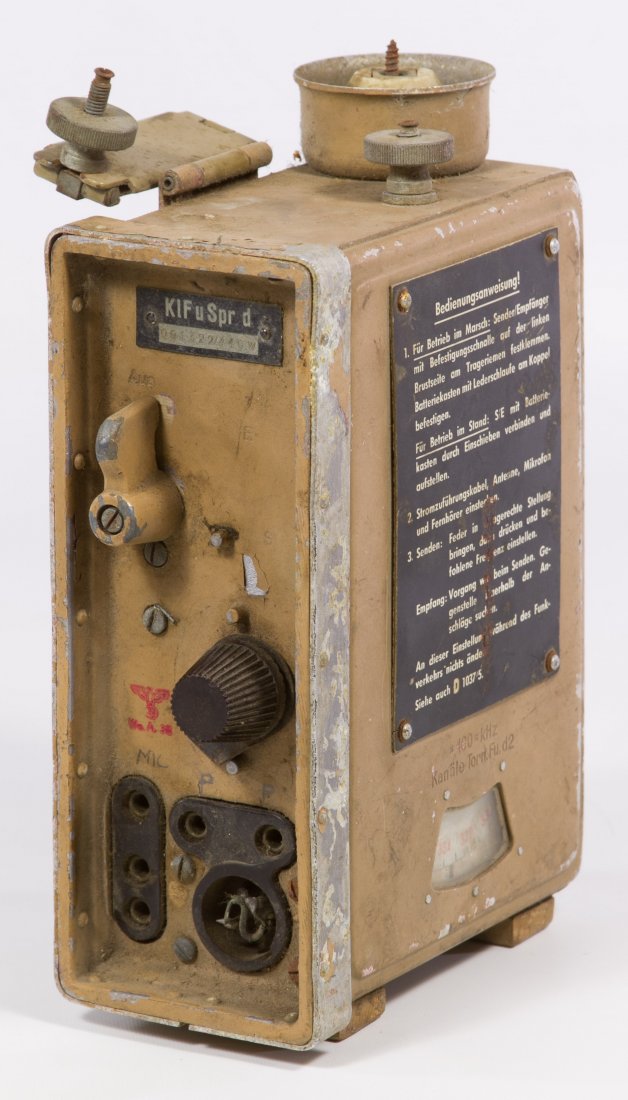 World War II German Nazi Field Radio Part: World War II German Nazi Field Radio Part Having a 'KIFu Spr d' mark, German language instruction panel, tan paint color and the German eagle with swastika mark Height: 8.00 inches, Width: 5.25 inches