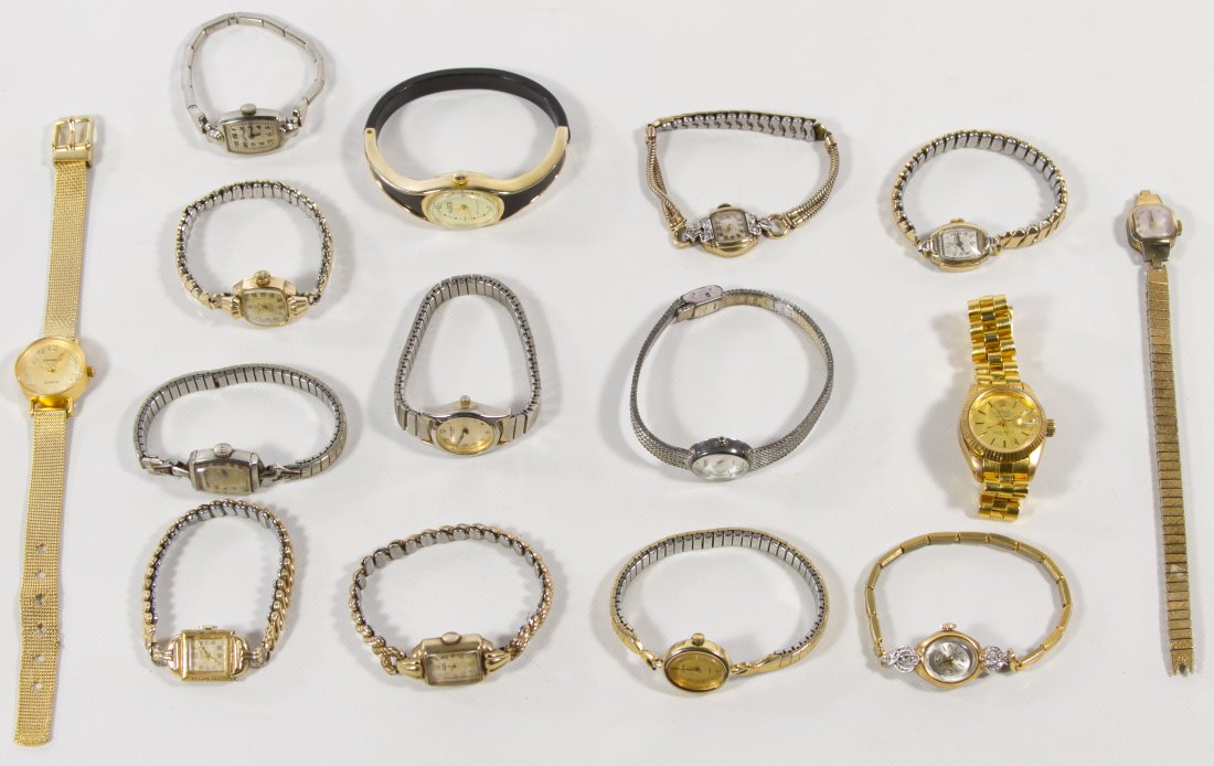 14k Gold Lady Elgin Wrist Watch: 14k Gold Lady Elgin Wrist Watch Together with fourteen wrist watches including Elgin, Gruen and Wakmann Length: 8.75 inches (longest) Category: Jewelry and Timepieces > Watches Shipping Status: Leonar