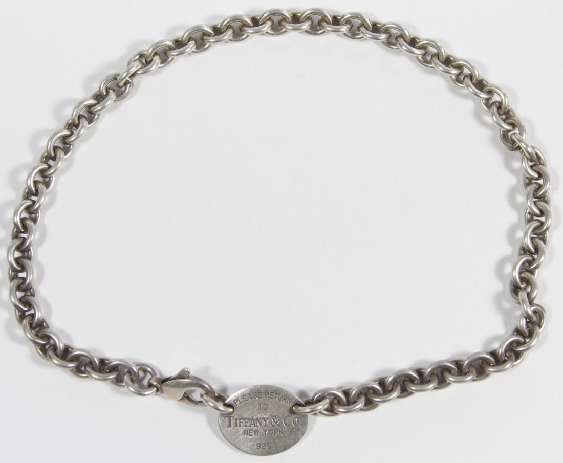 Tiffany & Co Sterling Silver 'Please Return to ...': Tiffany & Co Sterling Silver 'Please Return to ...' Chain Choker Necklace Having an oval 'return' tag Length: 15.25 inches Weight: 34.98 dwts. Category: Jewelry and Timepieces > Sterling Silver Shippi