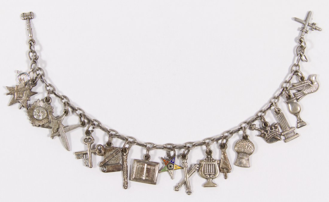 Sterling Silver Masonic Charm Bracelet: Sterling Silver Masonic Charm Bracelet Having nineteen charms Length: 7.00 inches Weight: 12.28 dwts. Category: Jewelry and Timepieces > Sterling Silver Shipping Status: Leonard Auction, Inc. will dir